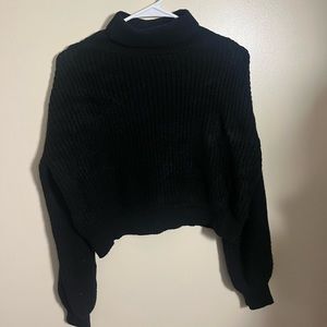 Cropped black knit turtleneck crop top